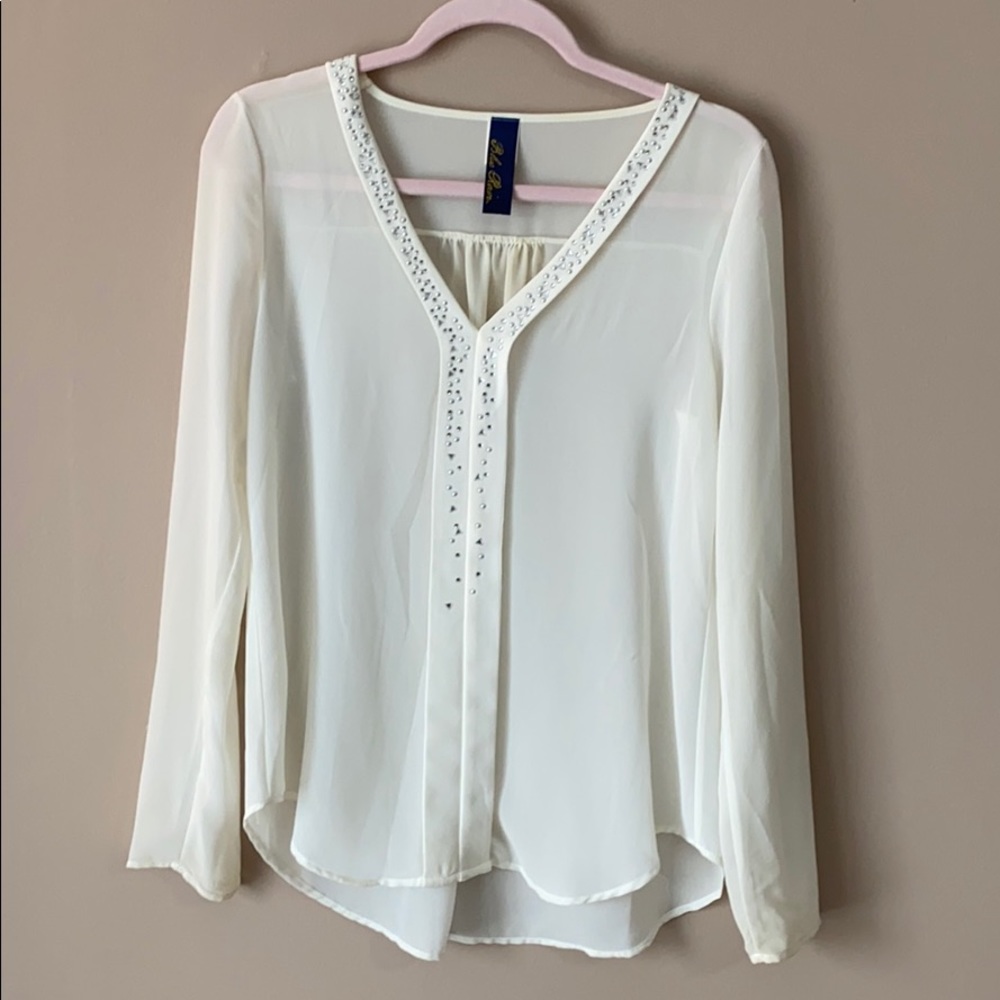 Ivory blouse with detail